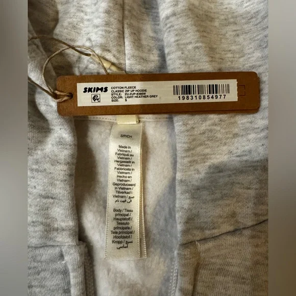 SKIMS Cotton Fleece Classic Zip Hoodie in Light Heather Gray - Picture 6 of 7